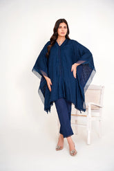 "Model in navy blue chikankari embroidered lawn kaftan set with lace placket and cotton bell bottom pants by Emeralds"