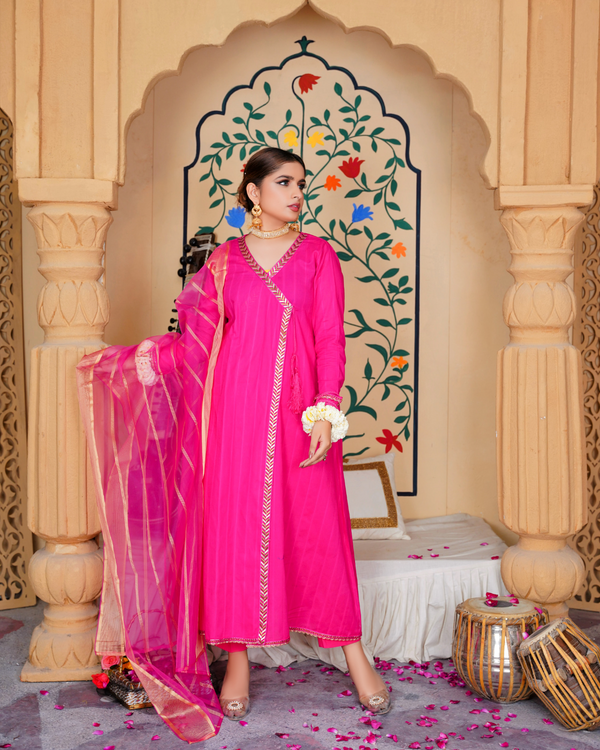 "Shocking pink Angrakha in textured lawn with zari lace and organza dupatta – festive summer outfit by Emeralds"