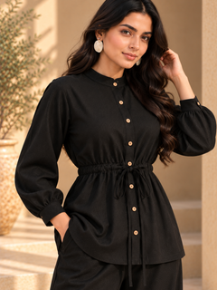 Close view of ONYX black Khaddi shirt with band collar, coconut buttons and gathered waist