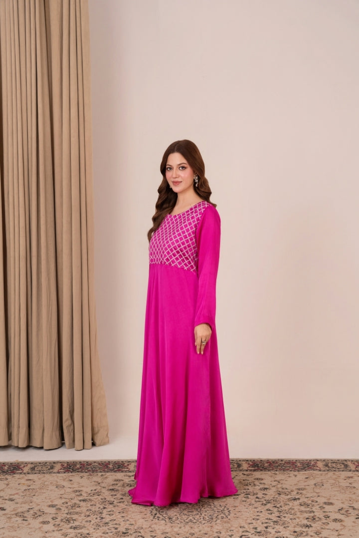 Close-up of criss-cross silver tilla and diamante handwork – Ruby dress