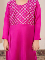 Pink dress with white lattice pattern on a plain background