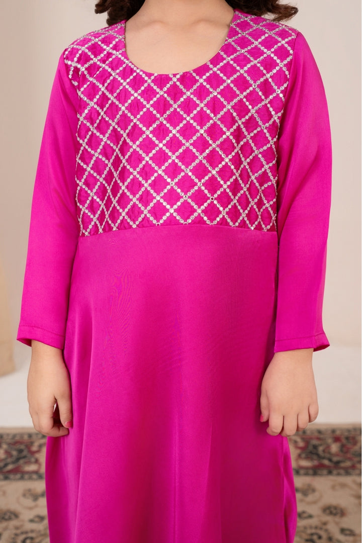 Pink dress with white lattice pattern on a plain background