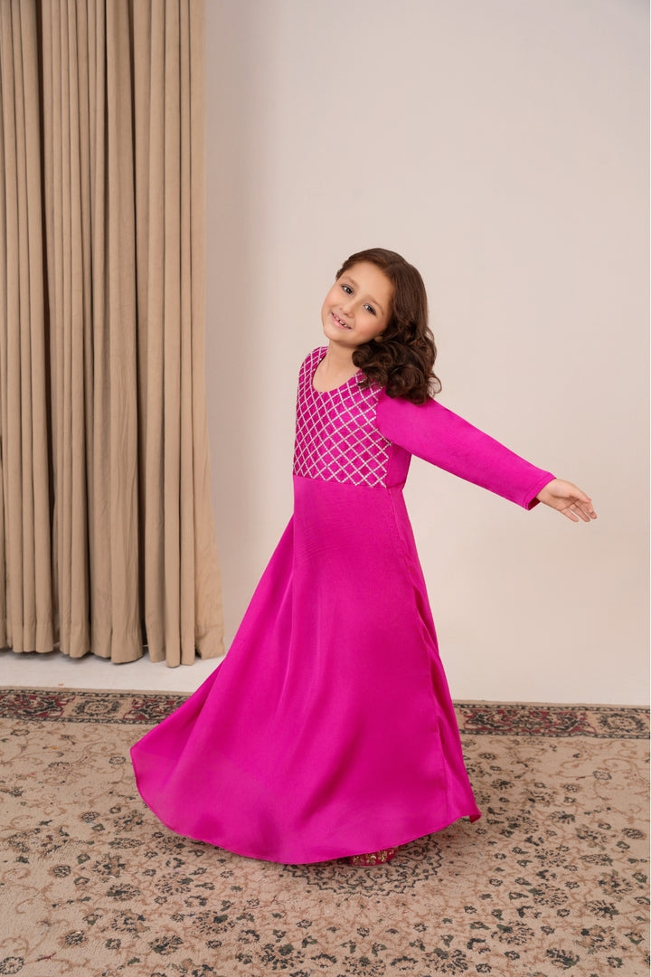 Close-up of criss-cross silver tilla and diamante handwork – Ruby dress