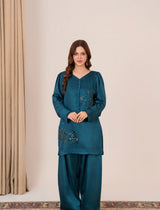 Peacock Whisper – Teal silk outfit with golden sequins and floral handwork