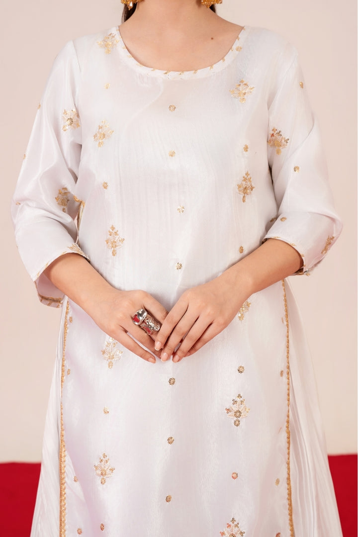 Starburst white silk ensemble – luxury embroidered women’s dress in Pakistan
