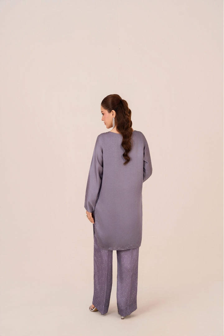 Close-up of sequin and diamante work on Lunar short shirt – Emeralds festive collection