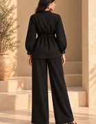 Back view of ONYX black Khaddi two-piece set showing gathered shirt waist and wide-leg fit