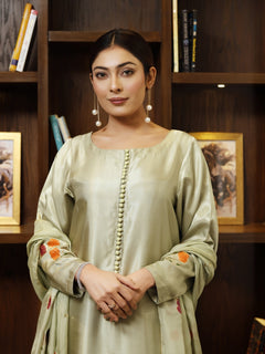 Model wearing stitched pistachio green pure silk outfit with hand-painted full-length shirt and embellished silk dupatta – front, side, and detail views.”