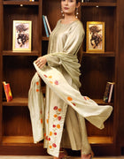 Model wearing stitched pistachio green pure silk outfit with hand-painted full-length shirt and embellished silk dupatta – front, side, and detail views.”