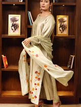 Model wearing stitched pistachio green pure silk outfit with hand-painted full-length shirt and embellished silk dupatta – front, side, and detail views.”