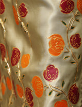 Model wearing stitched pistachio green pure silk outfit with hand-painted full-length shirt and embellished silk dupatta – front, side, and detail views.”