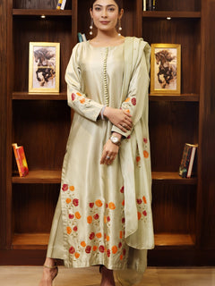 Model wearing stitched pistachio green pure silk outfit with hand-painted full-length shirt and embellished silk dupatta – front, side, and detail views.”