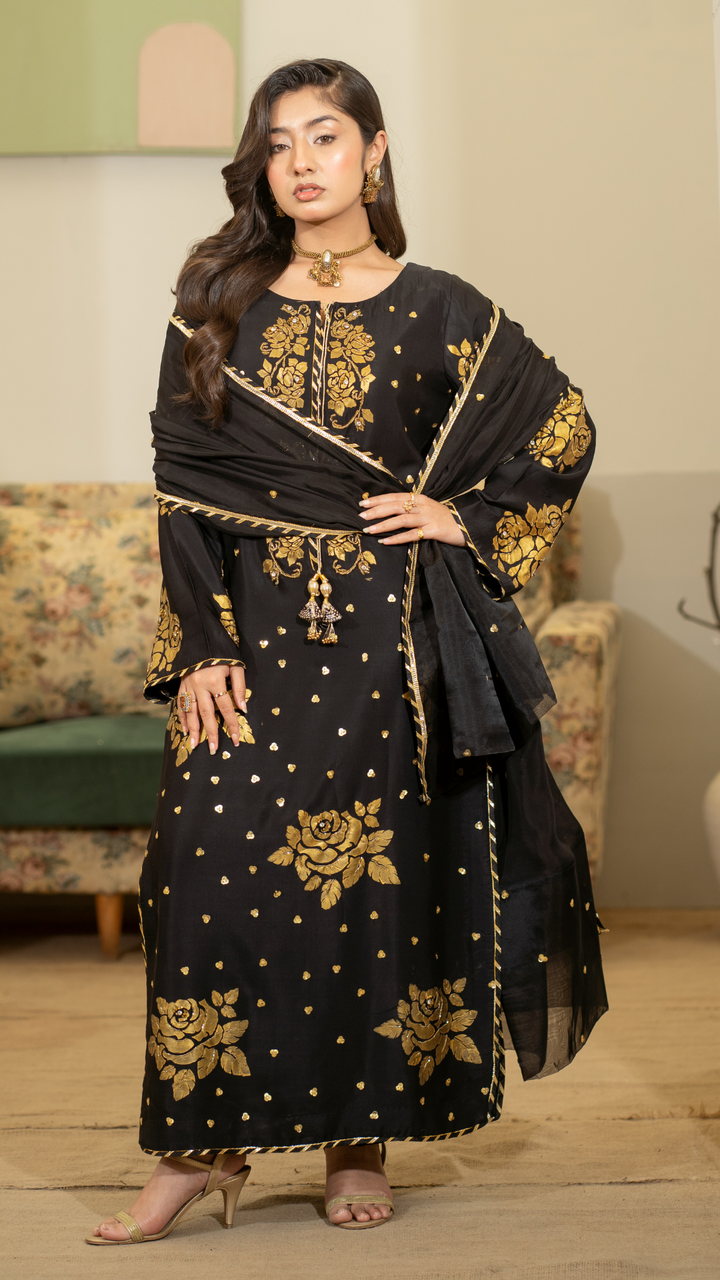 Black silk festive outfit with hand-painted golden rose motifs and intricate adda work – EmeraldsPK